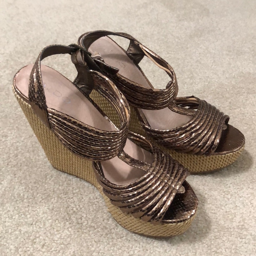 Cute used Aldo wedges! Metallic bronze color.